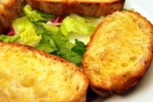 Gluten-Free Crostini with Sun-Dried Tomato Pesto and Feta Cheese